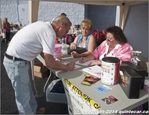 Nadyne Mattis, Director of Operations Quinte Access and Christine Mansfield volunteer register cars.